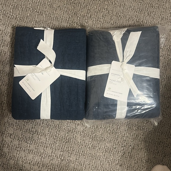 Pottery Barn pick stitch standard shams. Two navy blue unopened shams